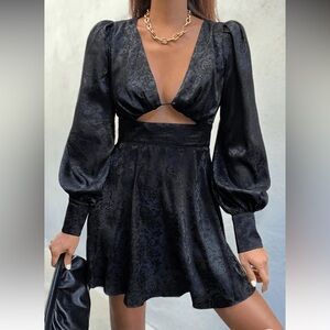 Elegant Black Dress with Puff Sleeves by Seven Wonders